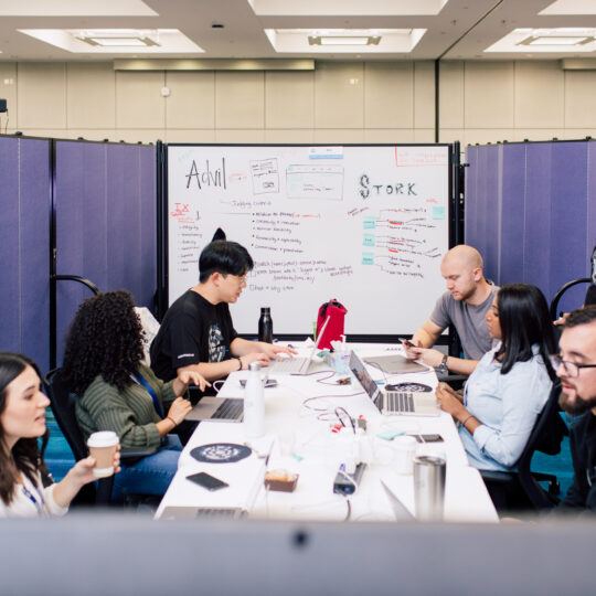 Team working around table