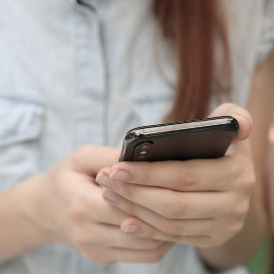 Women holding a phone