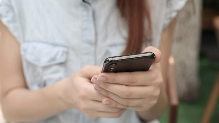 Women holding a phone