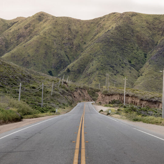 a road leading to mountains