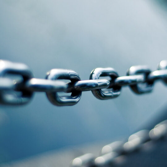 silver chain with a gray background