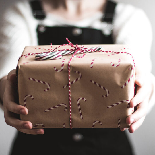 women holding a gift