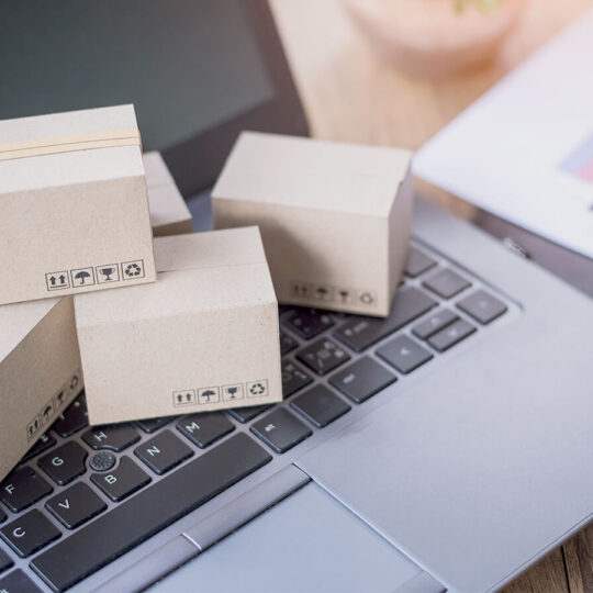 small packages on a laptop keyboard