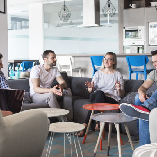 People sitting down and chatting