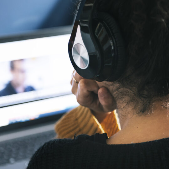 Inventory Packages represented by a person watching a video on a laptop