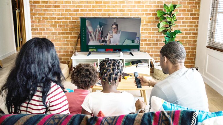 Family watching CTV representing content signal transparency