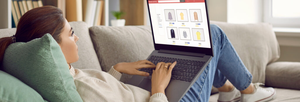 Woman shopping on laptop