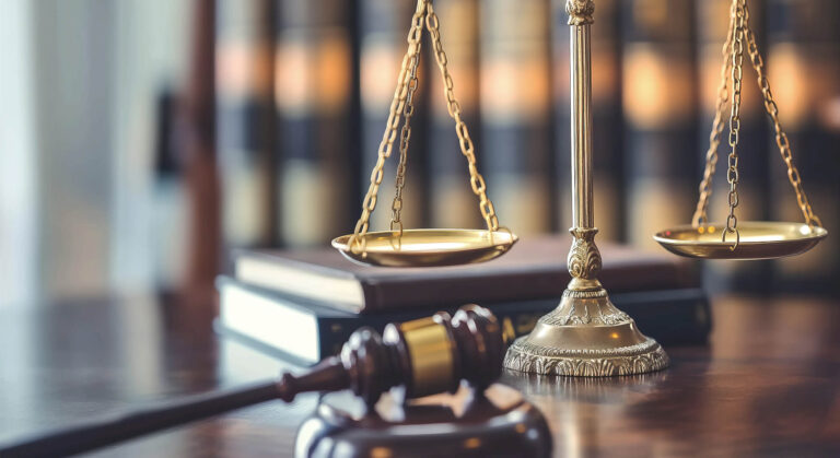 Gavel on wooden table