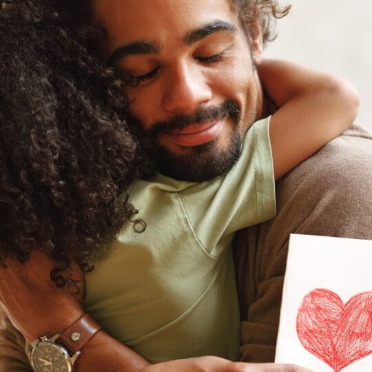 A father hugging their child