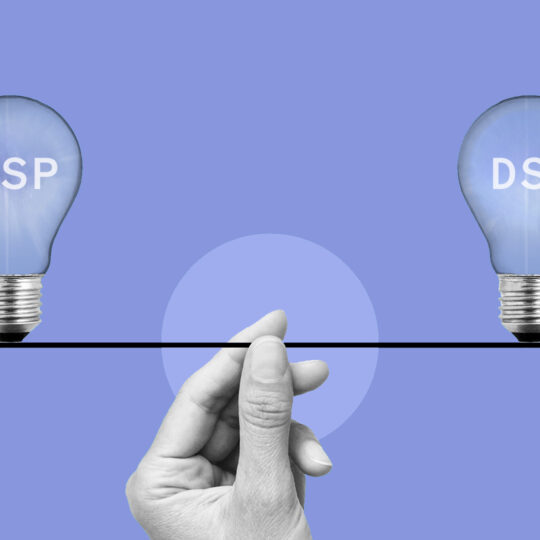 Hand holding a wire connecting two light bulbs with the words "SSP" and "DSP" within.