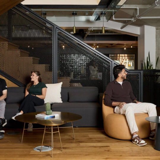 People in a sitting area talking