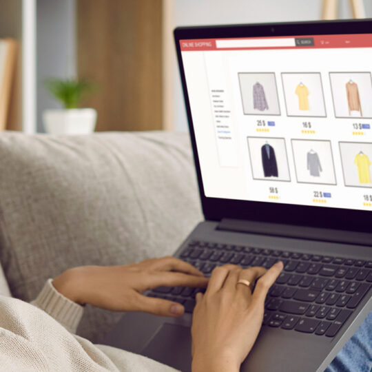 Woman shopping on her computer