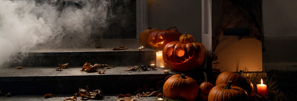 Jack-o-lanterns on a front stoop