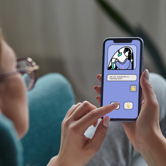 A person messaging on their phone