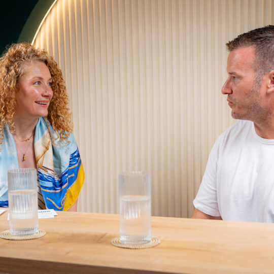 Two people speaking